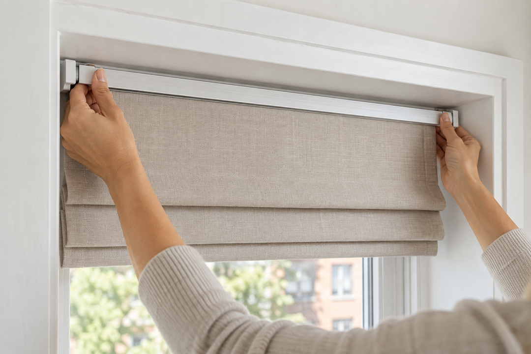 No-drill Roman shade installed in a neutral college dorm room
